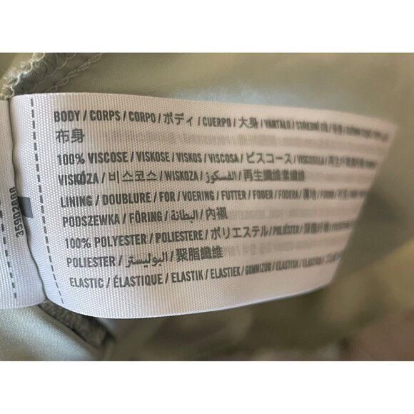 Hollister Light Green Smocked Floral Romper W/ Pockets & Versatile Off-Shoulder - Picture 8 of 9